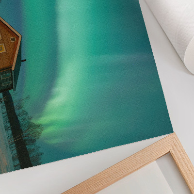 Decorative canvas print Northern Lights over the winter cottage