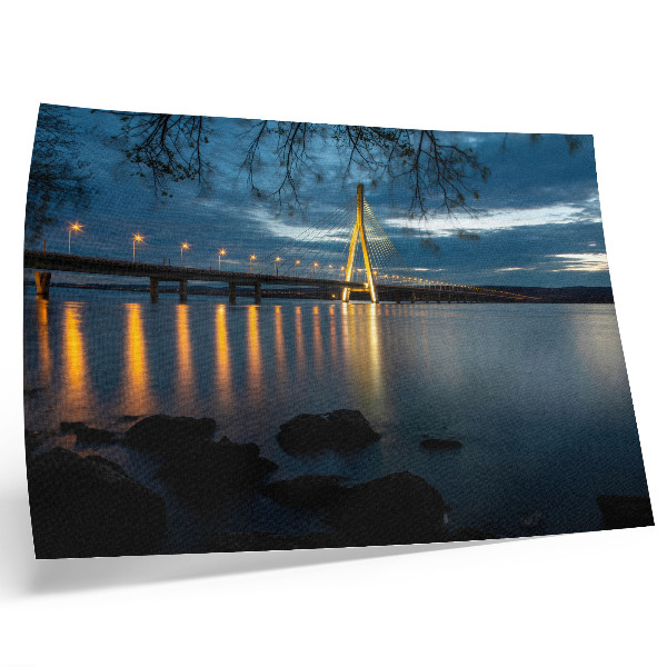 Decorative canvas print Illuminated bridge over the water at night