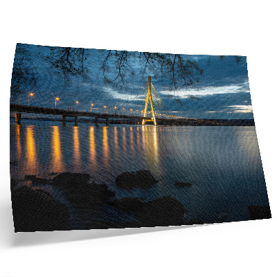 Decorative canvas print Illuminated bridge over the water at night