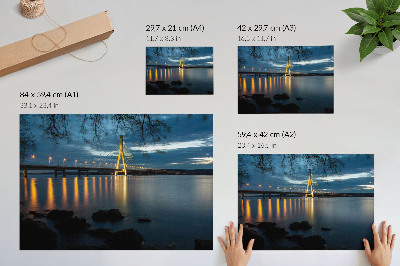 Decorative canvas print Illuminated bridge over the water at night