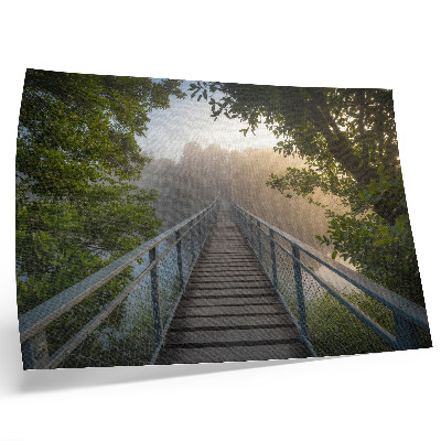 Poster A bridge in the fog over a river in green surroundings