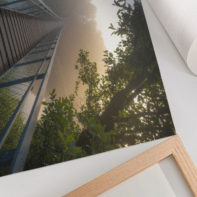 Poster A bridge in the fog over a river in green surroundings