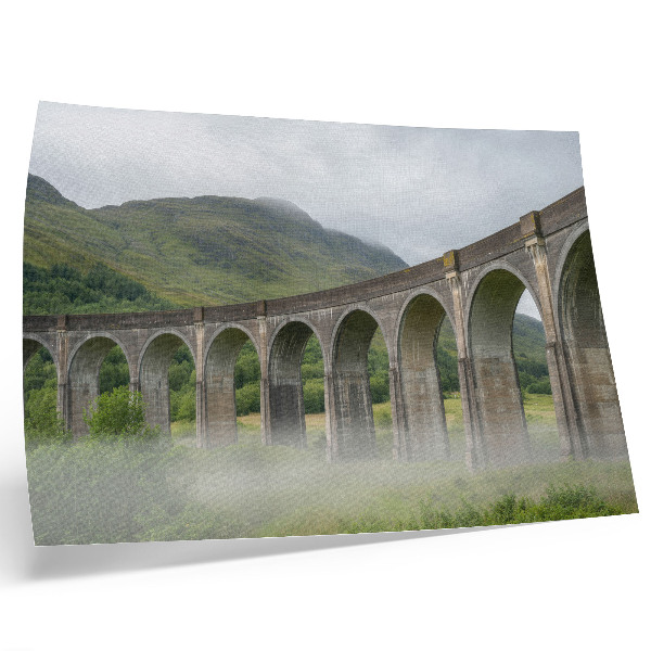 Decorative canvas print A majestic arch bridge among greenery