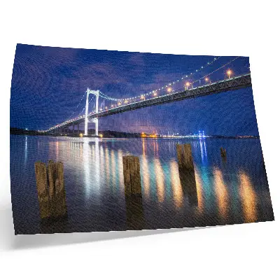 Photo canvas bridge at night reflecting in the water