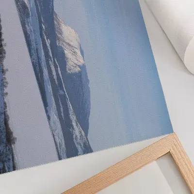 Poster snowy mountains winter landscape with a clear sky