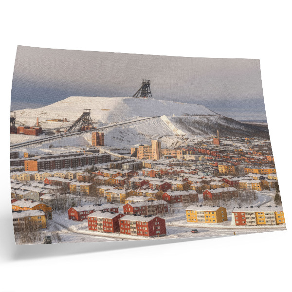 Decorative canvas print Winter town with colorful buildings contrasting with the snow