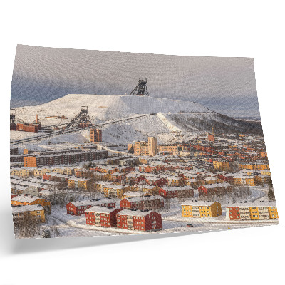 Decorative canvas print Winter town with colorful buildings contrasting with the snow