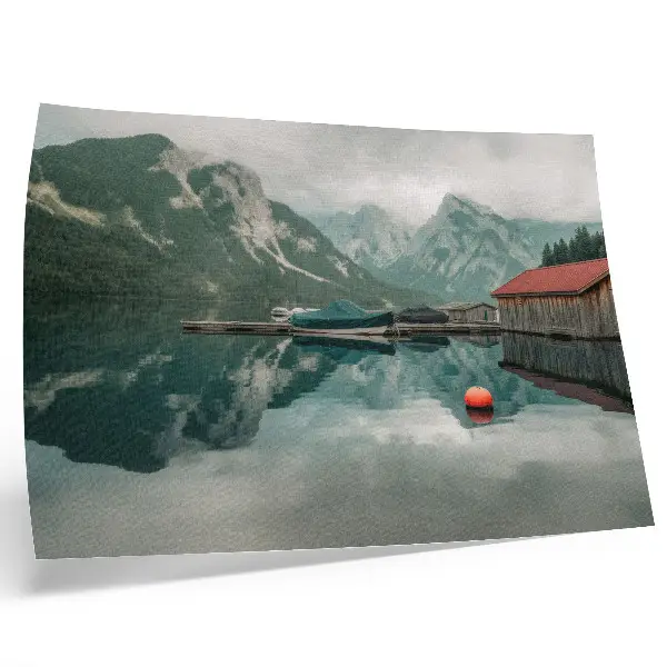 Photo canvas featuring a mountain lake with reflections and wooden boats