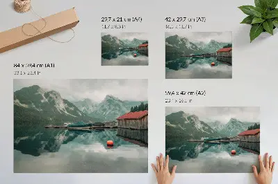Photo canvas featuring a mountain lake with reflections and wooden boats