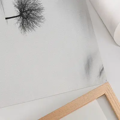 Decorative canvas print featuring a minimalist winter tree landscape in a harmony motif