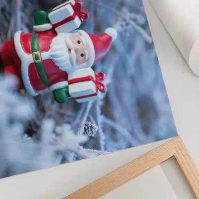 Santa Claus with gifts decorative canvas print in a winter setting