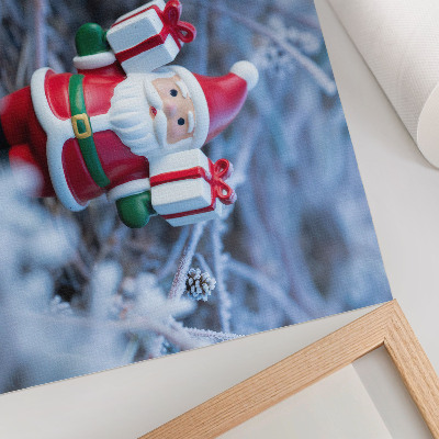 Decorative canvas print Santa Claus with gifts in a winter setting