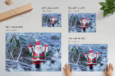 Decorative canvas print Santa Claus with gifts in a winter setting