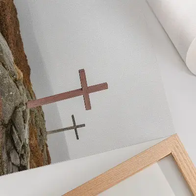 Poster three wooden crosses on a misty hill