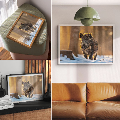 Decorative canvas print A wild boar on a winter background surrounded by sunlight