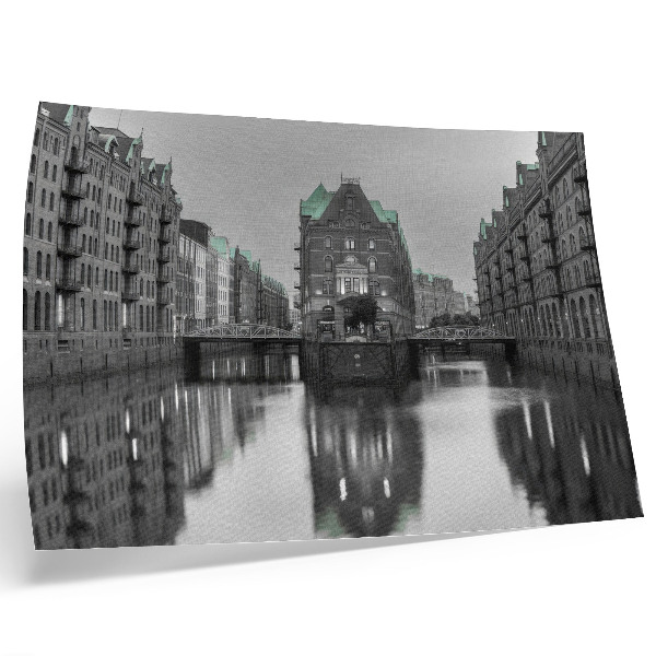 Poster Canal with industrial buildings, reflections in the water