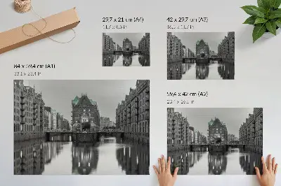 Poster canal with industrial buildings and water reflections