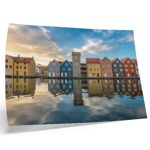 Poster Colorful houses by the water reflections architecture