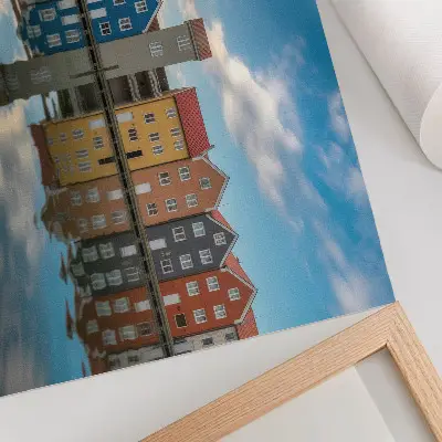 Poster colorful houses by the water with architectural reflections
