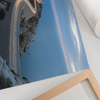 Photo canvas A picturesque landscape with a lantern and a winding road at night
