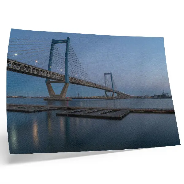 Photo canvas bridge at dusk with calm water and a modern touch