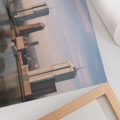Photo canvas Impressive skyscrapers and an elegant bridge over the river