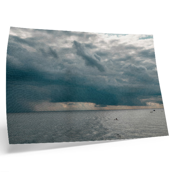 Photo canvas Stormy sky over an ocean full of space