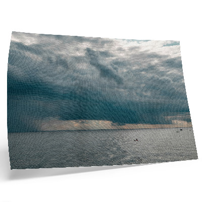 Photo canvas Stormy sky over an ocean full of space