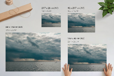 Photo canvas Stormy sky over an ocean full of space