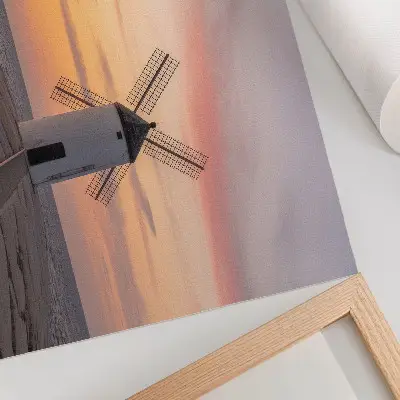 Poster windmill in sunset light with a pastel sea sky