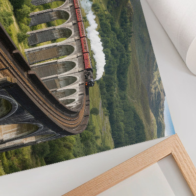 Photo canvas A viaduct with a train among green hills