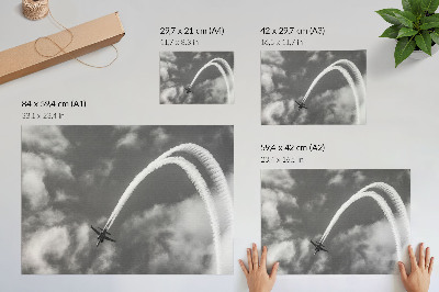 Photo canvas Airplane in the sky with dynamic cloud streaks