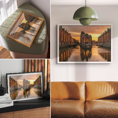 Decorative canvas print Calm water, brick buildings, warm light