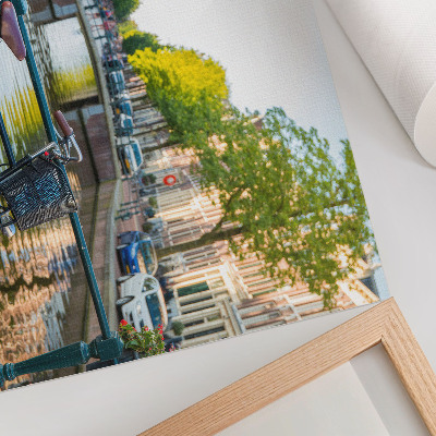 Photo canvas Canal, bridge, trees, buildings, bicycle, flowers