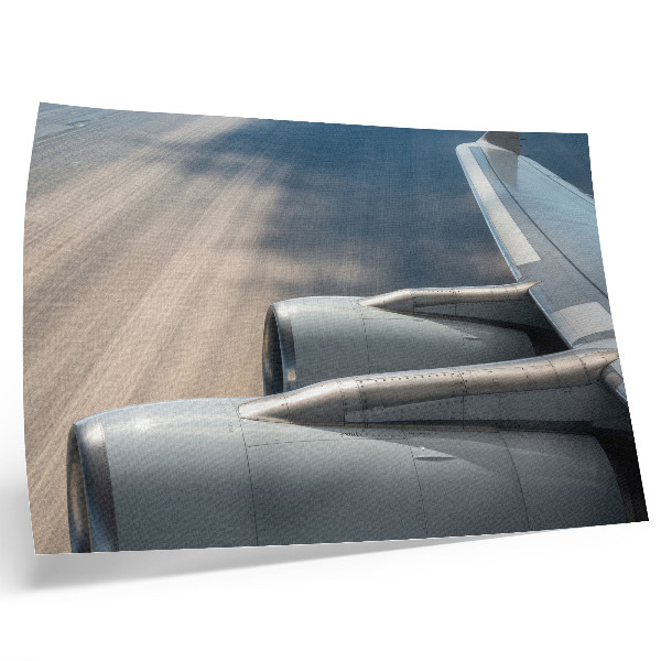 Decorative canvas print Airplane wing with dynamic perspective
