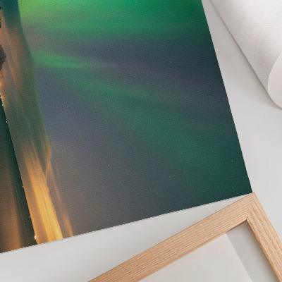 Decorative canvas print Aurora Borealis over a cold mountain landscape