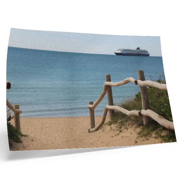 Decorative canvas print featuring a beach with a ship, sea, wooden railings, and sand