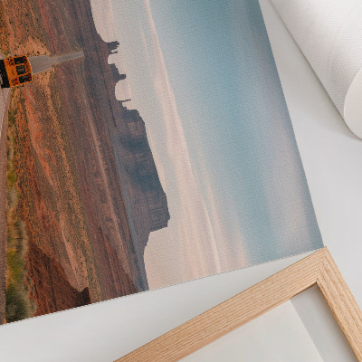 Decorative canvas print A straight road, monumental mountains, warm colors