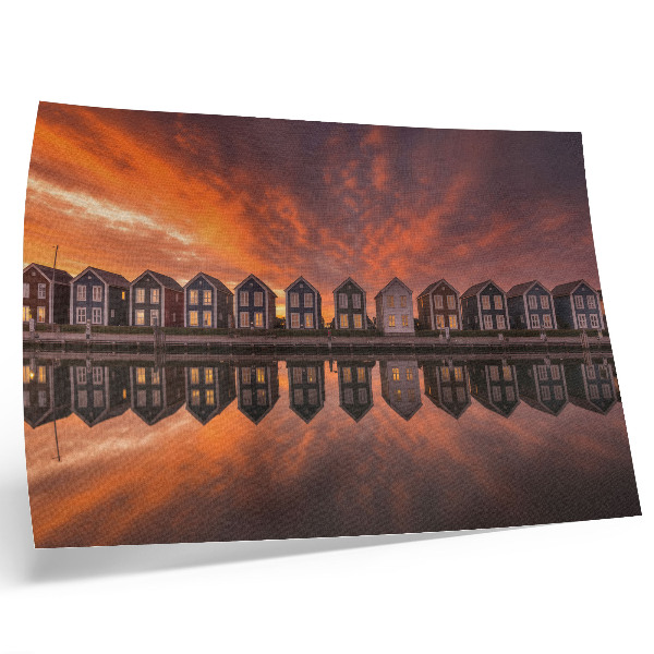 Decorative canvas print Colorful houses by the water in the sunset light