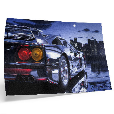 Decorative canvas print A sports car in an urban landscape at night