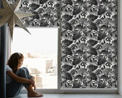 Modern roller blind with a gray leaves pattern
