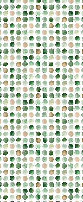 Fabric roller blind with green circles pattern