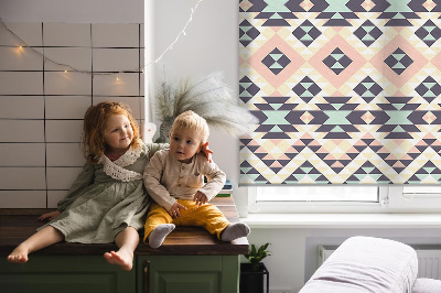 Fabric roller blind with a triangle pattern