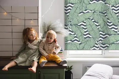 Modern roller blind with a palm leaves print on a black and white background