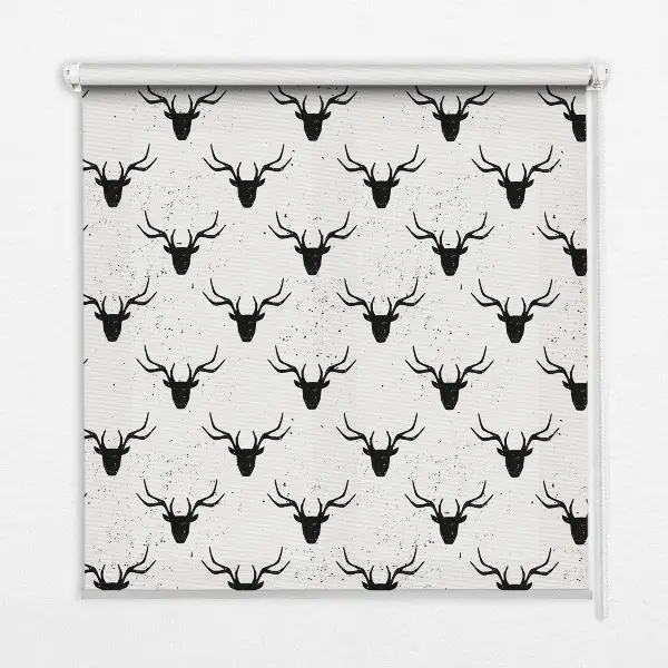 Fabric roller blind with black deer heads pattern