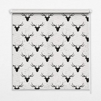 Fabric roller blind with black deer heads pattern