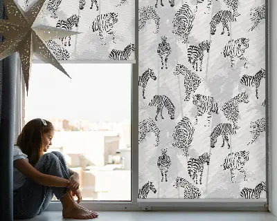 Fabric roller blind with a gray animal pattern