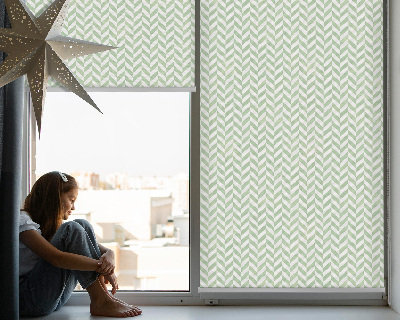 Roller blind for large window in green herringbone