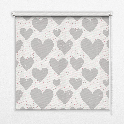 Fabric roller blind with a gray hearts pattern