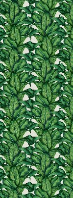 Fabric roller blind with a green leaves pattern